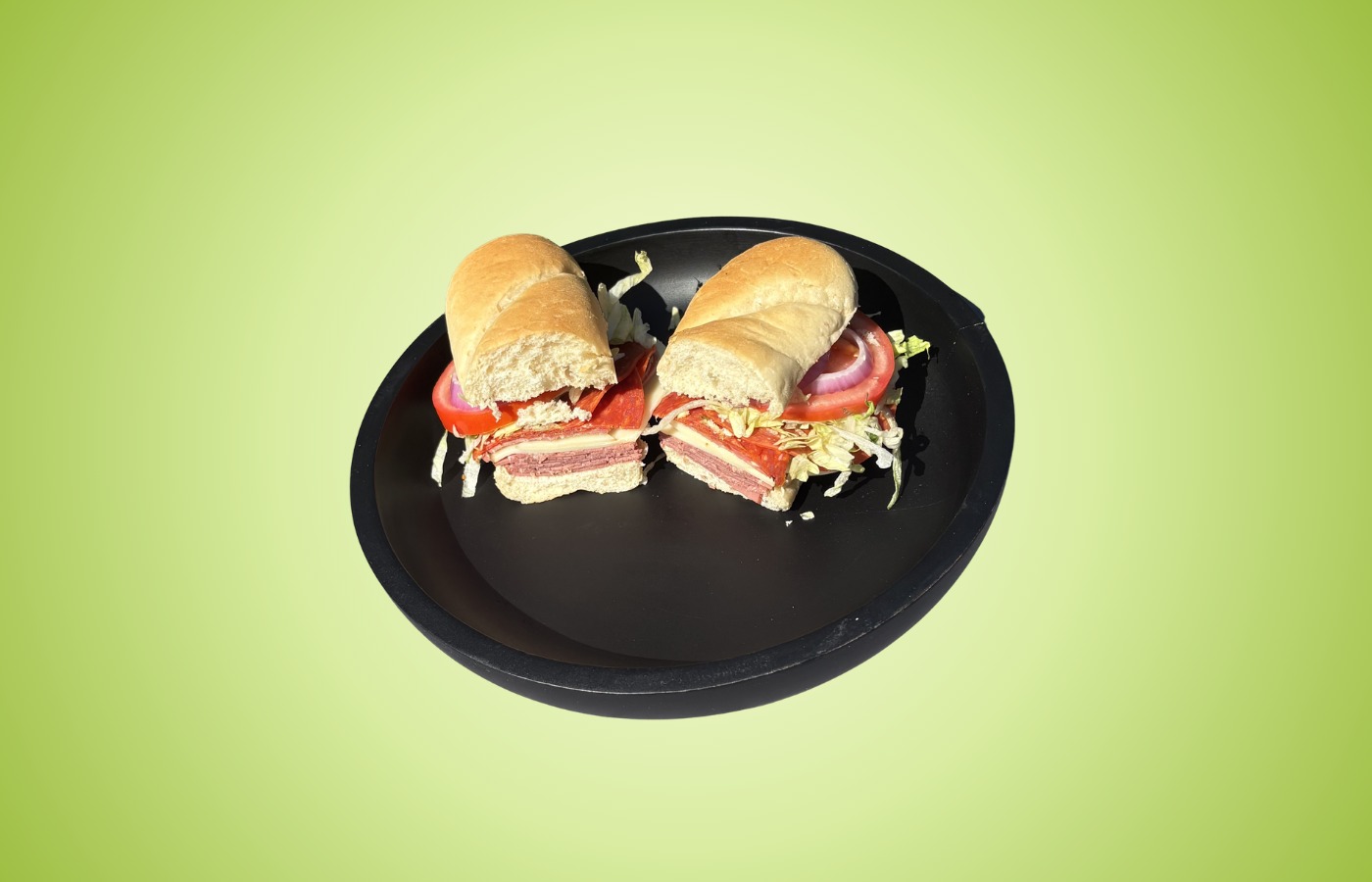 Victoria’s Italian sandwich with Italian meats, provolone, lettuce, tomato, and onion on a toasted Kaiser roll
